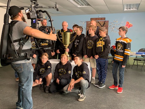 Film crews, Ron MacLean and the West Carleton Warriors were in Dunrobin Oct. 1 filming promos for this year's Good Deeds Cup challenge. Photo by Shelley Welsh