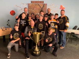 Don MacLean joined the Warriors for their last time to get to pose with the Good Deeds Cup. Photo by Jake Davies