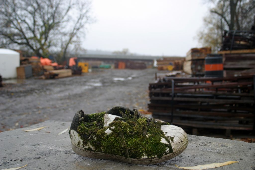 This shoe is one of the treasures found by construction workers during the Mississippi River Bridge replacement project in this Hallowe'en day photo. Photo by Jake Davies