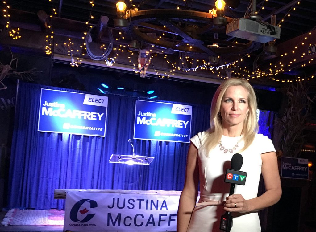 CTV reporter Patricia Boal stands in front of Conservative Candidate Justina McCaffrey's stage on Election Night - a stage that looks like it cost more than Green Party candidate Purdy's entire Election Night party. Courtesy Twitter/Patricia Boal