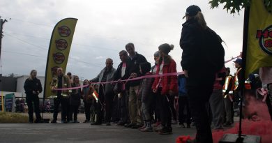 Constance Bay Taekwon Do teacher Ron Sparks and his grandaughter Summer cut the ribbon to start the Kicking Breast Cancer in the Butt walk/run last Sunday. Photo by Jake Davies
