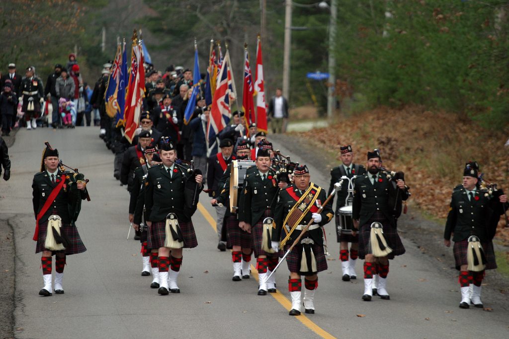 The Stormont Dundas Glengarry Highlanders lead the veterans parade at the Branch 616 Remembrance Service. Photo by Jake Davies