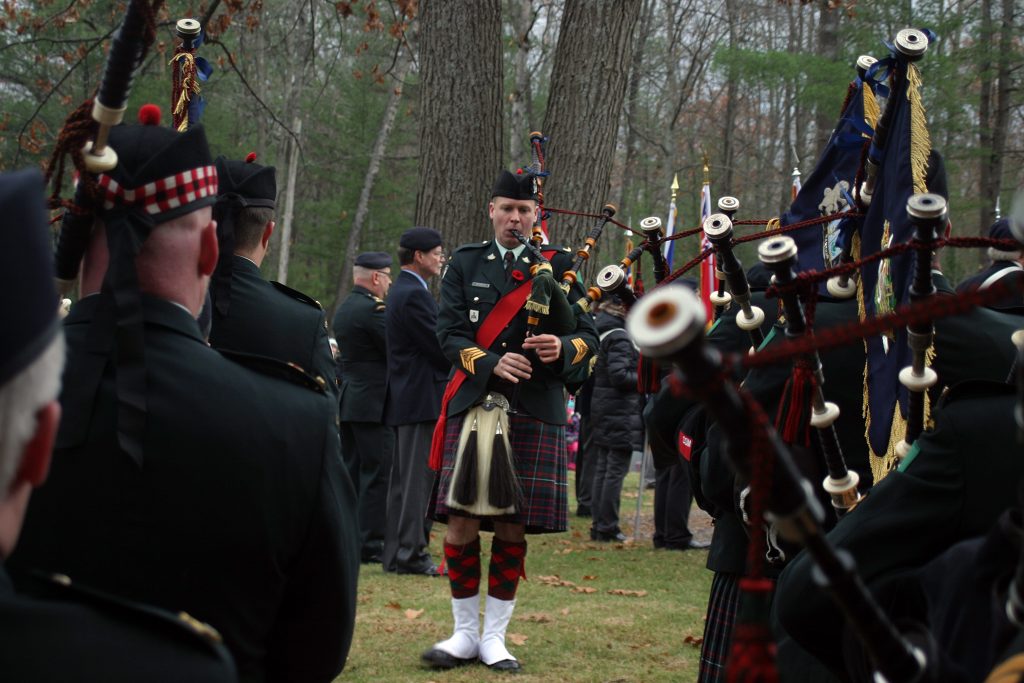 Highlanders piper Chris Reasbeck leads the Final Post. Photo by Jake Davies