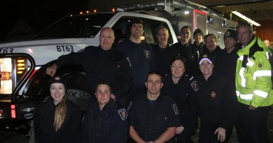 Constance Bay volunteer firefighters pose with their new tool - Brush Truck 63. Photo by Jake Davies