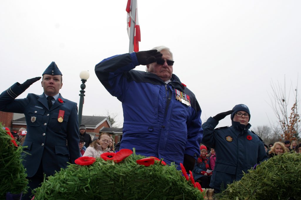 World War Two veteran, West Carleton's Dr. Roly Armitage salutes his fallen comrades after laying a wreath at the West Carleton War Memorial on Nov. 11. Photo by Jake Davies