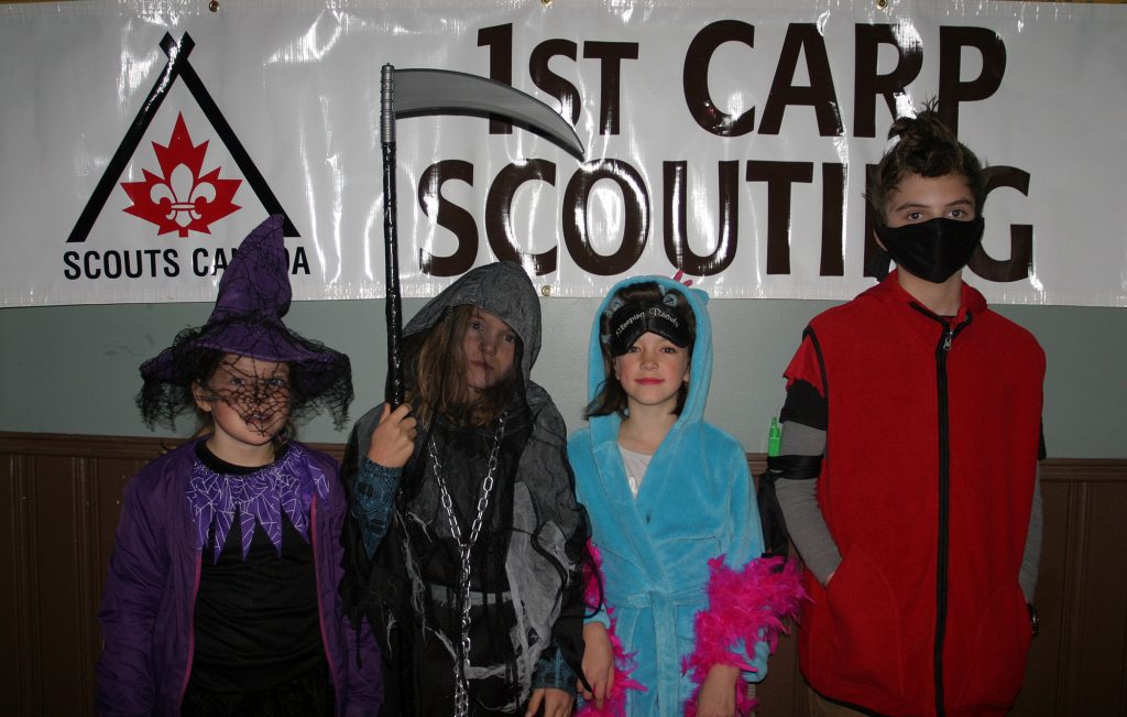 From left, volunteers Hope Trusler, Skye Trusler, Zoe Gagne and Sheldon Flegal pose for a photo. Photo by Jake Davies