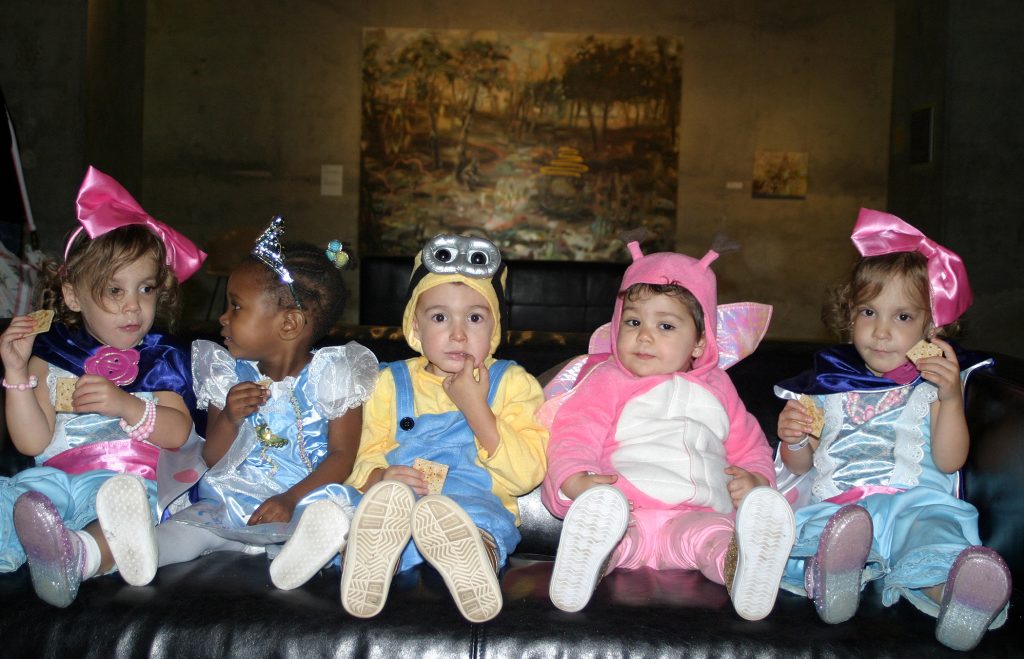 From left, Stittsville's Abby, 2, Tianna, 2, Gustavo, 2, Laura, 1 and Ashleigh, 2, rest their tiny feet at the Diefenbunker Toddlers Hallowe'en Hunt. Photo by Jake Davies