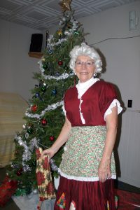 Judy Gravel, who brought an old family recipe, won for best Christmas costume. Photo by Jake Davies