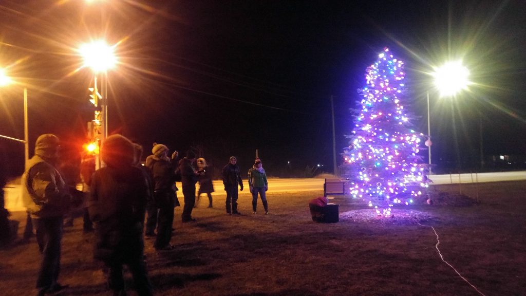 Around 50 people came out to help light Dunrobin's well-lit Christmas tree Sunday evening. Photo by Beth McEwan