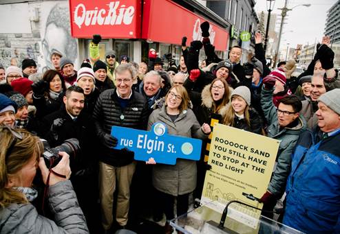 The mayor and others celebrate the reopening of Elgin Street Dec. 16. Courtesy City of Ottawa