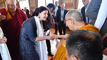 Dunrobin's Arya Landers meets the 14th Dalai Lama in Bogh Gaya, India and presents him with two poems last week. Courtesy the house of H. H. The Dalai Lama