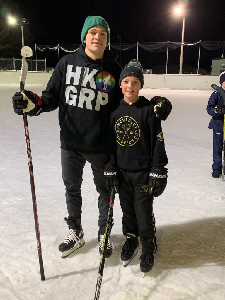 West Carleton Warrior Blake Voelker poses with Ottawa Senator Mark Boroweiki. Photo by Shelley Welsh