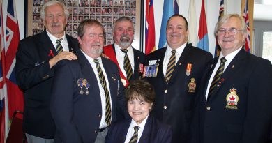 From left, Branch 616 executive Tom Watters, John Woodbeck, Sergeant-at-Arms Rob Gallant, Secretary Arleen Morrow, Zone Commander and Branch 240 President Rob Madore, and Vice President Bogdan Procyk pose for a photo on New Year's Day. Photo by Jake Davies