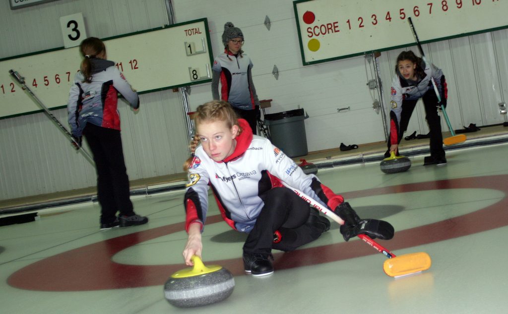 Katrina Frlan and the rest of the team work on delivery drills during Monday evening's practice. Photo by Jake Davies