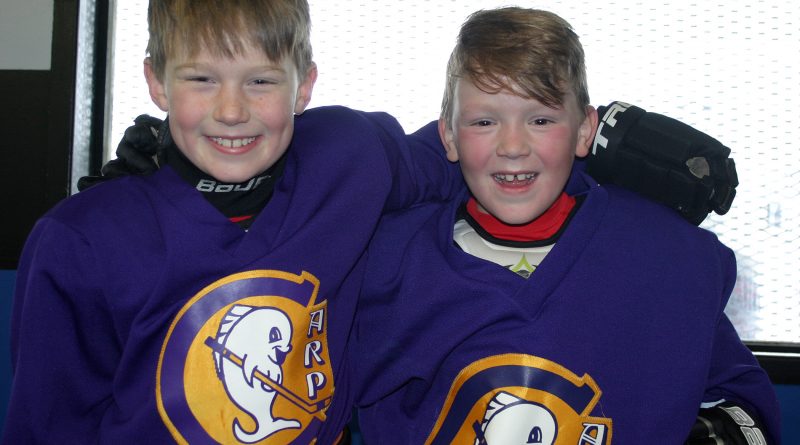 From left, Oden Findlay, 8, and Blaine Sproule, 8, were pumped to start their second year in the WCOHL last Saturday. Photo by Jake Davies