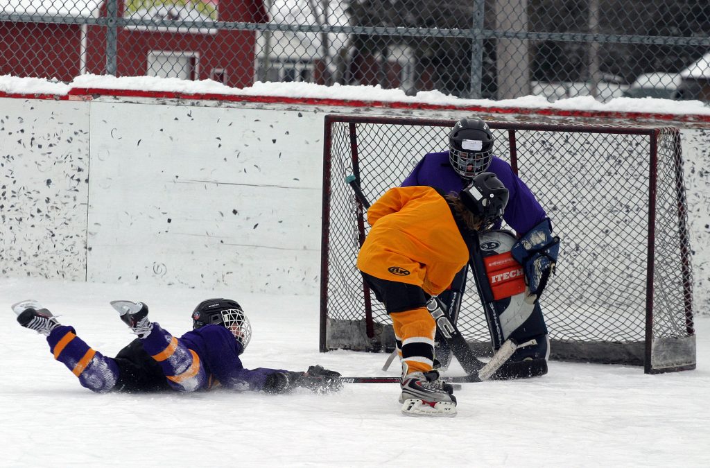 The cold didn't stop the kids from giving their all in last Saturday's WCOHL season kick-off in Carp. Photo by Jake Davies