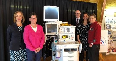 From left, Mary Wilson Trider, Anne Fleming, Lorna Bradley, Dr. Melissa Forbes, and Rob Scott pose with the hospital's new equipment. Courtesy the AGH