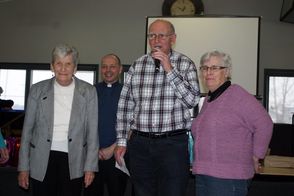 Gary Fisher introduces 96-year-old Arley Smith, far left, who was celebrating her birthday. Photo by Jake Davies