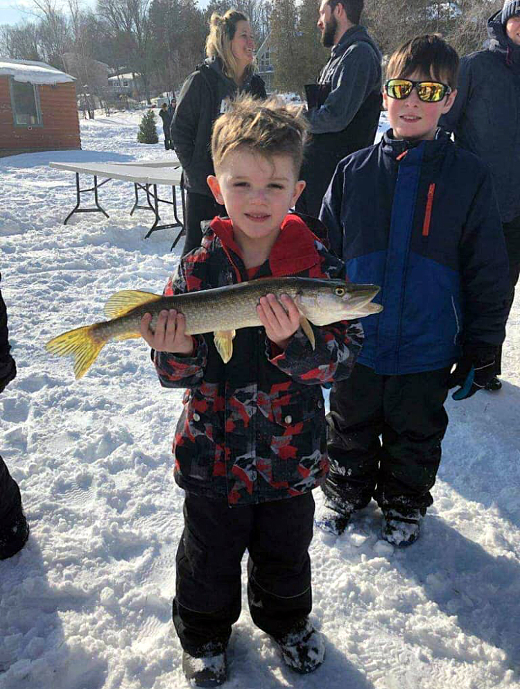 Foster Lessard shows off his mighty big fish. Courtesy Shadine Robinson