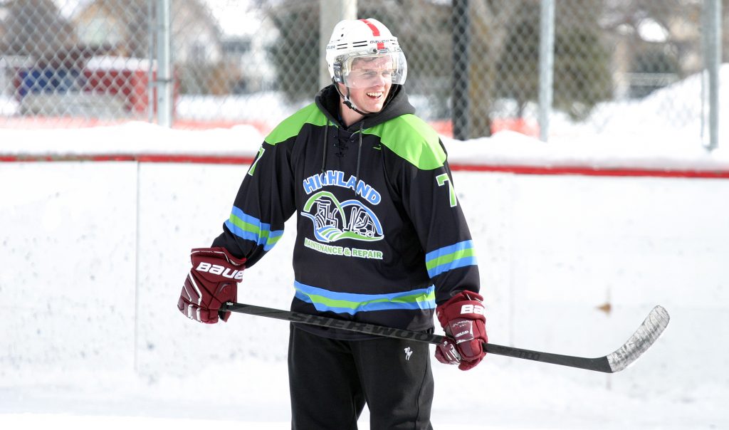 Hockey4Humanity organizer and West Carleton volunteer firefighter Alex Carlson gets a litte game action in. Photo by Jake Davies