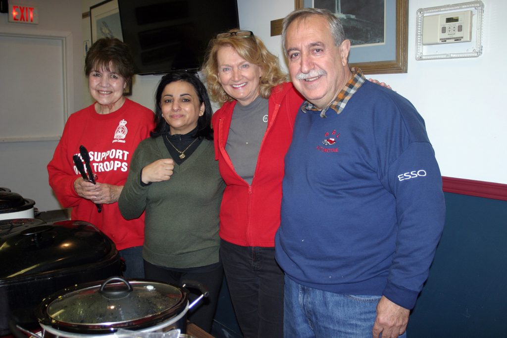 From left, the Legion's Arlene Morrow, Constance Bay Pharmacy's Tamara Awada, MP Karen McCrimmon and Coun. Eli El-Chantiry helped serve breakfast. Photo by Jake Davies