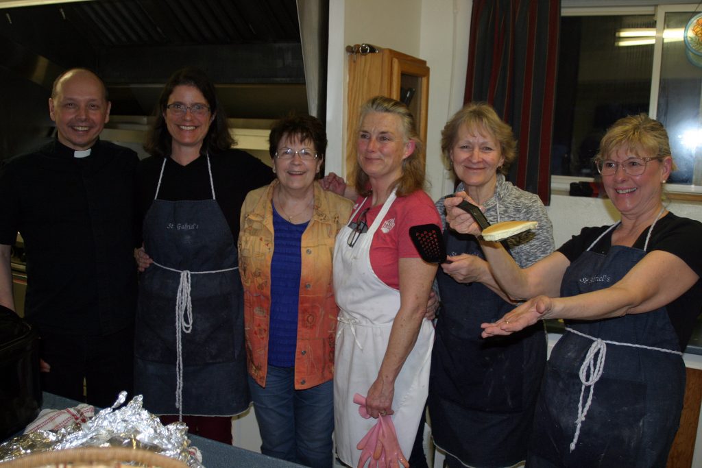 Constance Bay was cracking as volunteers, from left, Father John Orban, Michele Davey, Gail Smith Eilleen Muldoon, Nerina Doyle and Sue Johnson kept the flapjacks flipping. Photo by Jake Davies