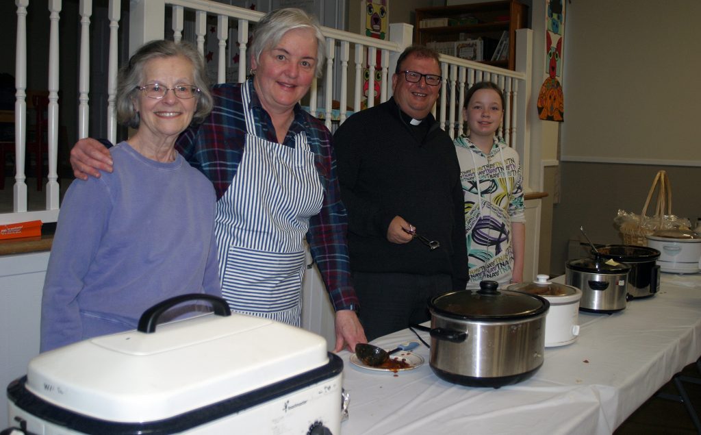 From left, the Huntley Parish crew in Carp includes, Mary Cox, Brenda Baird, Rev. Baxter Park and Natasha Cook. Photo by Jake Davies