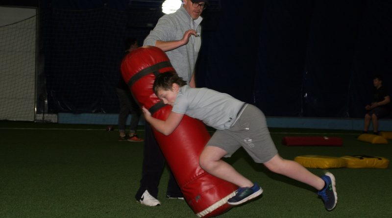 Arnprior's Alex Geddes, 12, shows off his tackling skills at the first Skills and Drills