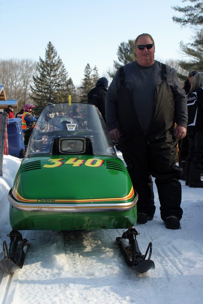 Pakenham's Phil Sadler poses beside his '78 John Deere Cyclone. Photo by Jake Davies