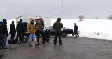 Far right, actor Walton Goggins walks to his car before pulling out his cell phone and asking the famous hitman question, "is there a problem?" during filming at the Diefenbunker today. Photo by Jake Davies
