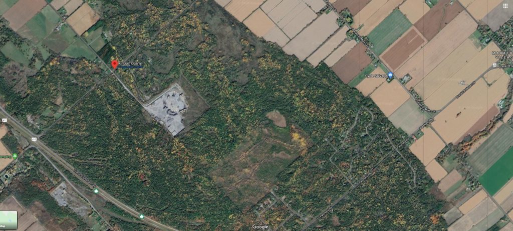 The Kinburn Quarry is the grey area on the left side of the photo, while Deerwood Estates is located right of the quarry where you can see the network of roads. Courtesy Google Maps