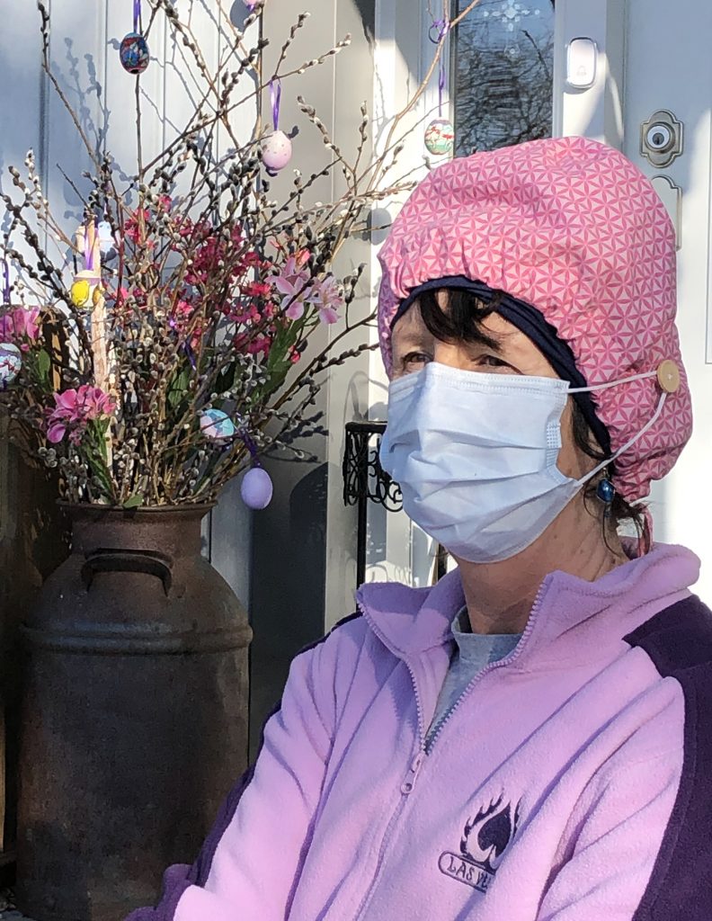 West Carleton's Tracey Zoobkoff shows off a scrub hat with buttons to help hold a surgical mask in place while giving her ears a break. Courtesy Zoobkoff