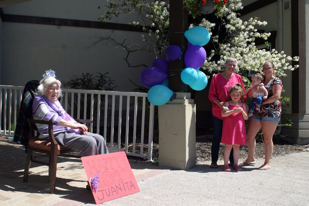 Juanita and exactly six feet away, her daughter Megs Coulbourn, her grandaughter Jacci Coulbourn and her great grandaughters Lean and Hunter. Photo by Jake Davies