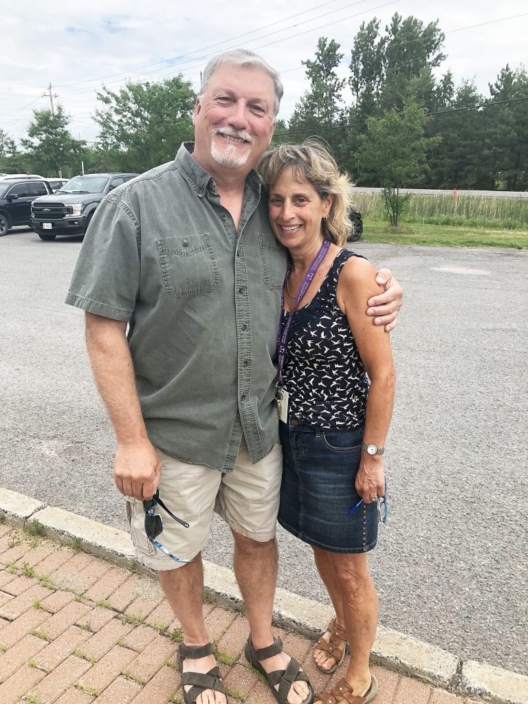 Principal Cindy Alce and her husband Dan Longpre enjoy the moment. Photo by Laura Ladouceur