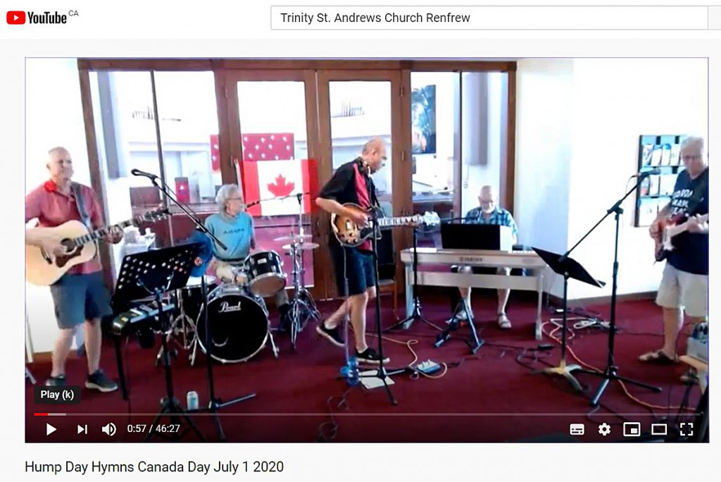 Mike McCormick (centre) of the Arrogant Worms, is also Trinity St. Andrew's music director, here performing the Mixed Nuts regular series Hump Day Hymns on Canada Day. Screengrab