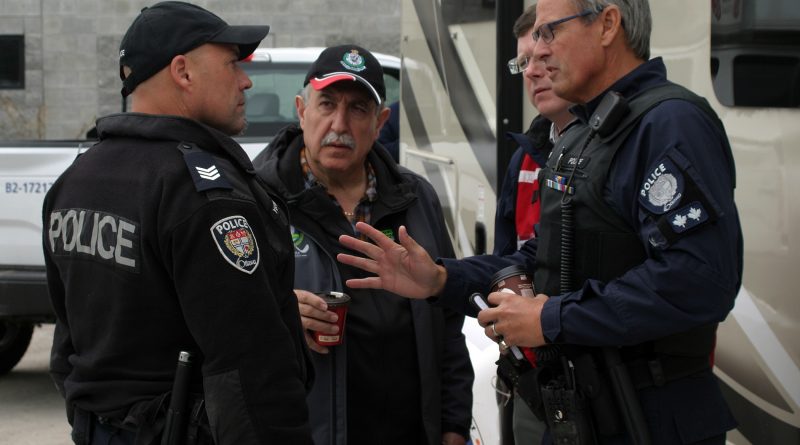 Coun. Eli El-Chantiry speaks with members of the Ottawa Police Service during extreme flooding in the spring of 2019. Crime in Ward 5 took a big dip in 2019 over 2018. Photo by Jake Davies