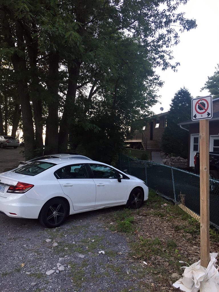 Cars parked illegally Photo by Georges Cyr