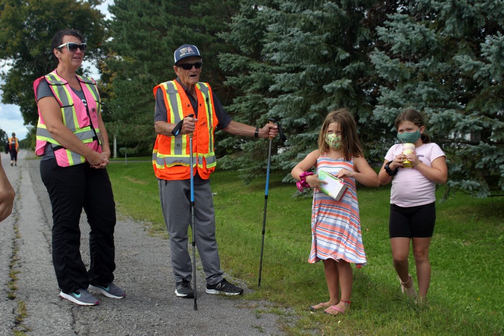 Papa takes a short break to talk with young fans on his 10-day journey to CHEO yesterday. Photo by Jake Davies