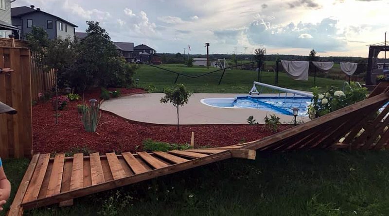 Last night's storm toppled hydro poles and caused some damage in West Carleton including knocking these fences down on Porcupine Road in Dunrobin. Photo by Emily Glossop-Nicholson