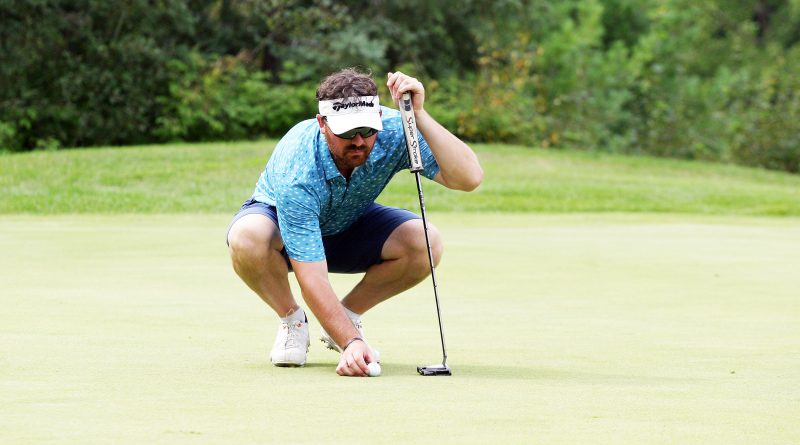 Adam Ferris lines up a putt on Hole 11 on Day 2 of the Eagle Creek 2020 Open Championship held over the weekend. Photo by Jake Davies