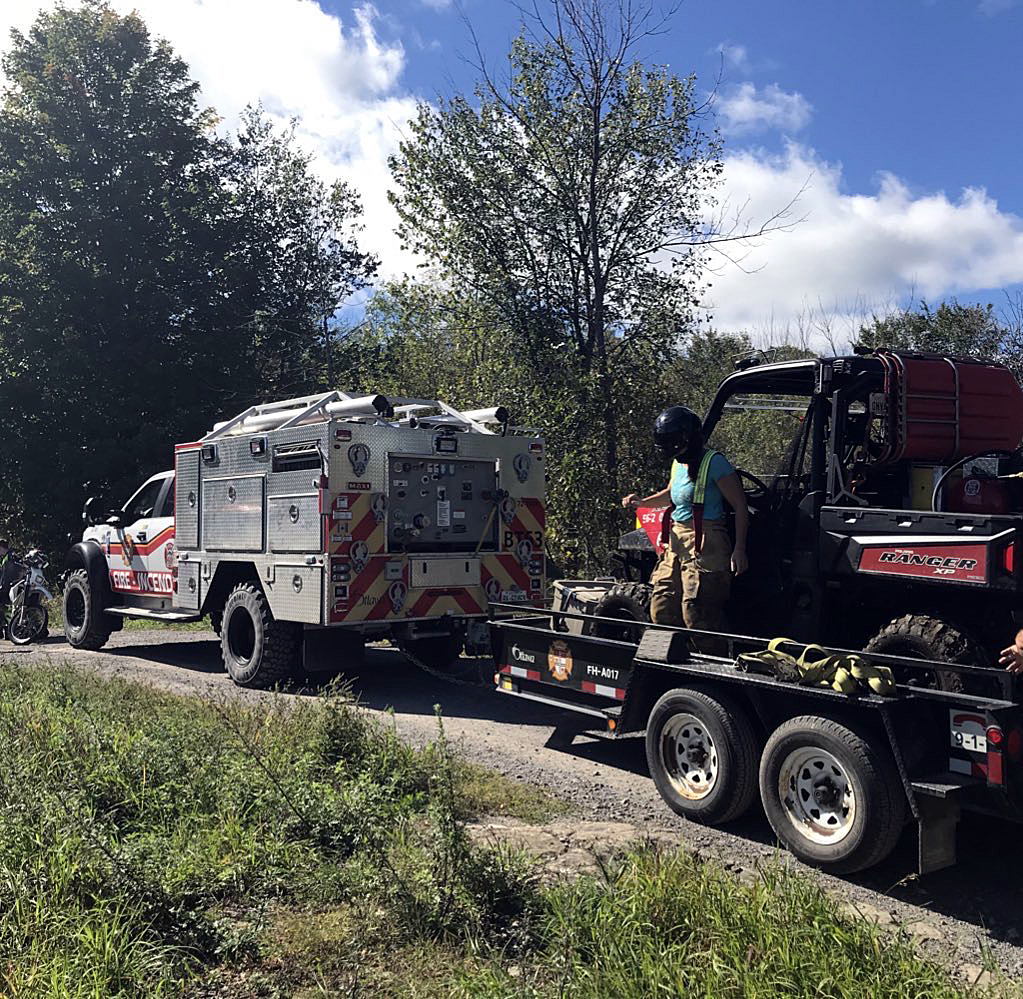 Firefighters bush truck, utility vehicle and an unstuck dirt bike