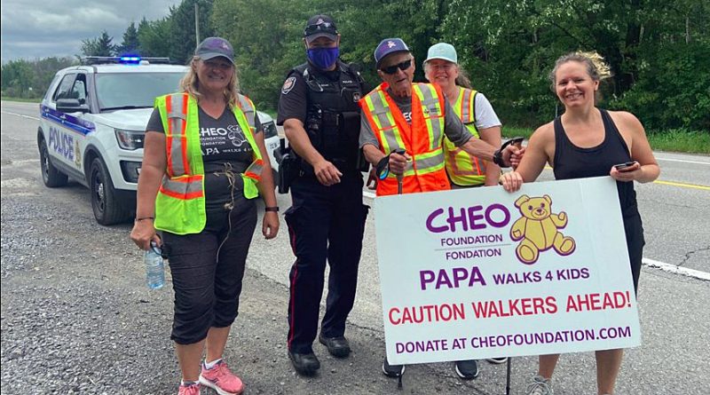 Beachburg's Russell 'Papa' Mackay, centre, will reach his destination of CHEO later today and will have raised close to $100,000 doing so. Courtesy Crystal Mackay