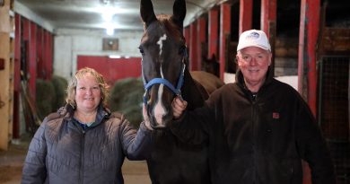 Glenda and James Armitage and their two-year-old filly Dashing Muscle.
