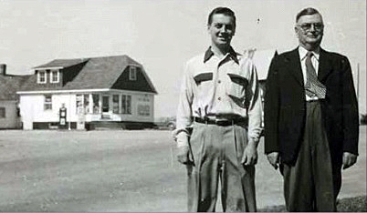 Bob Vance and his father Robert pose in front of their Woodlawn store.