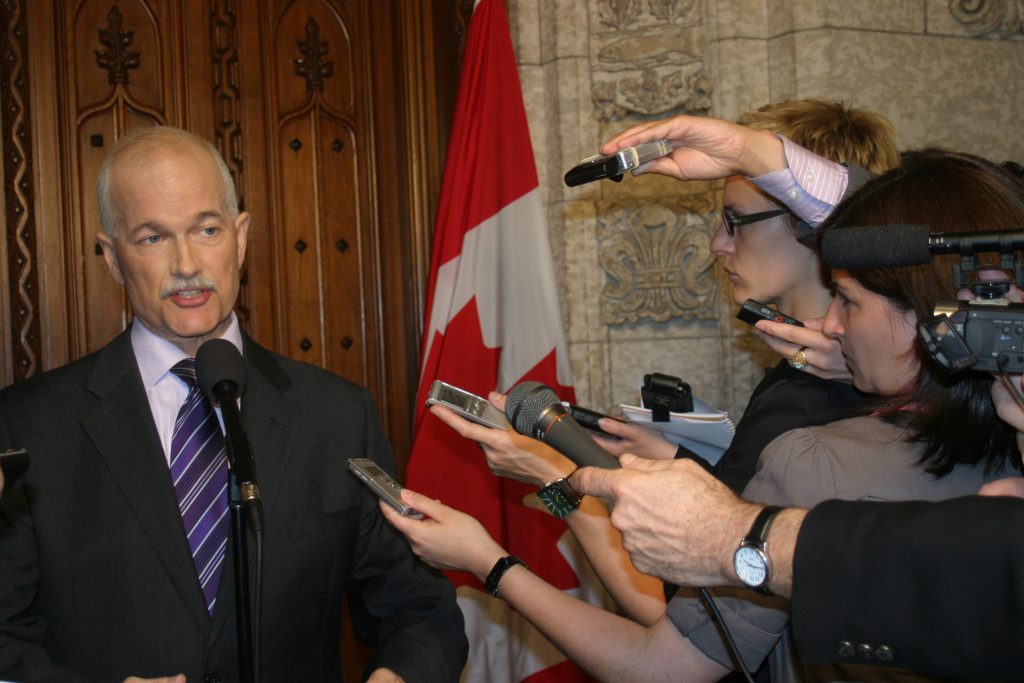 Jack Layton speaks to the media in 2011.