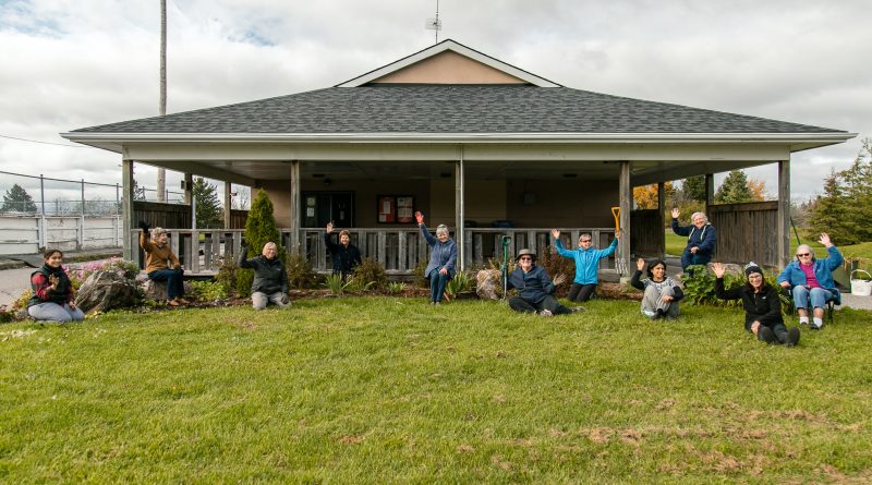 A photo of the Corkery Garden Club in front of the Corkery Community Centre.