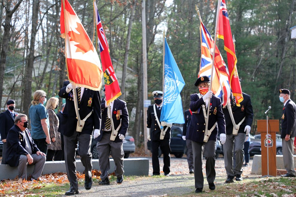 The Branch 616 Colour Guard approaches the cenotaph at the beginning of Satruday's service. 