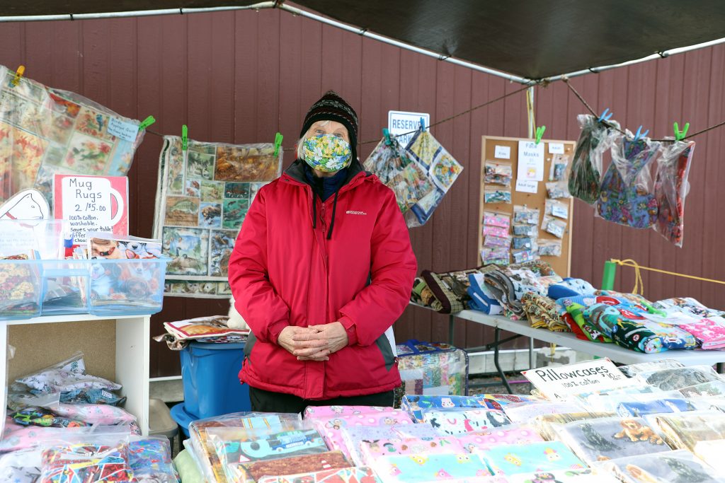 Woodlawn's Barb Hare poses in her Carp Farmers' Market booth.