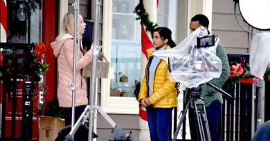 Tiya Sircar, Michael Xavier, and Kristen Kurnik in Christmas on Wheels (2020).