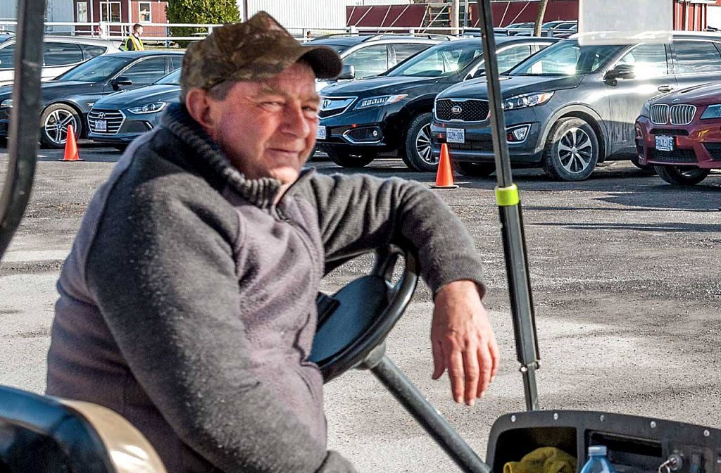 Dave Creighton in his beloved golf cart.